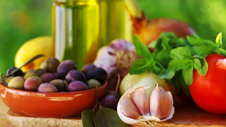 Kalamata Olive: Spread on Toast with Tomatoes and Arugula